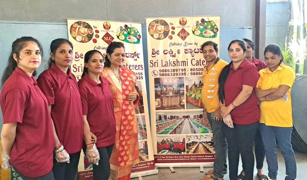 Sri Lakshmi Caterers service team in maroon uniforms ready for an event