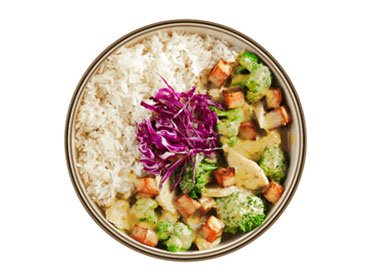 Single portion rice and vegetable bowl packed for a corporate meal box