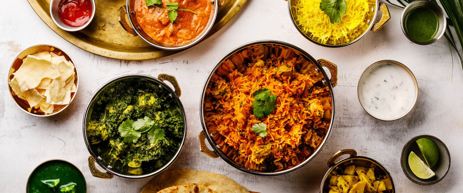 Vegetable biryani and curry options offered in corporate meal boxes
