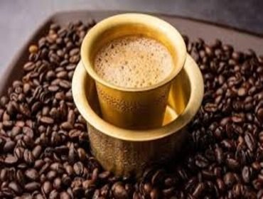 South Indian filter coffee served in a traditional steel tumbler