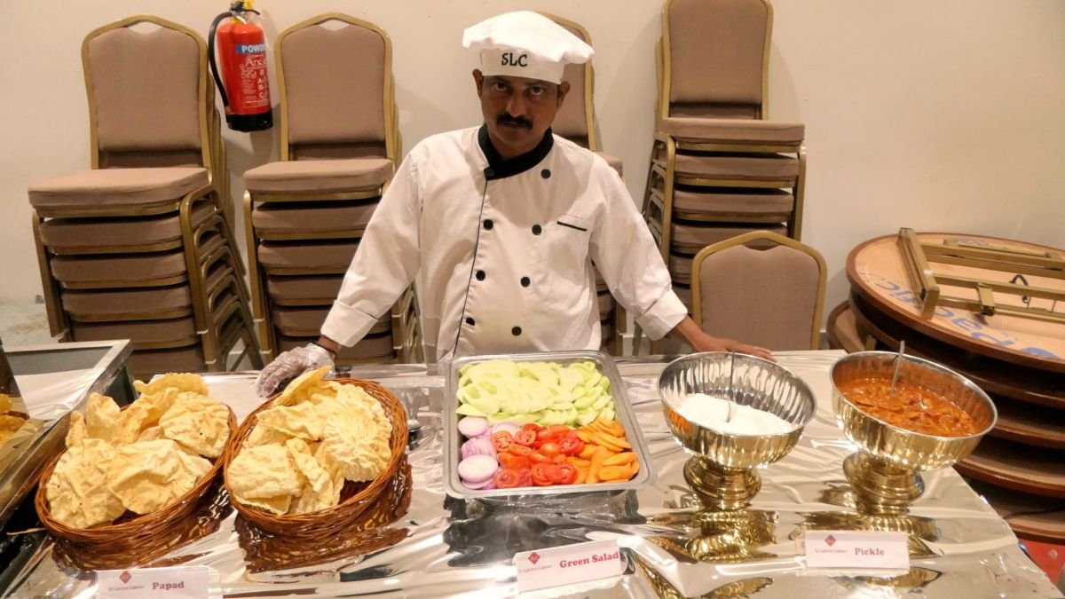 Chef preparing food at a live counter during a Bangalore event