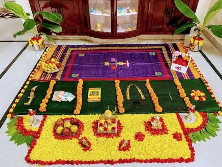 Rangoli decoration laid out for an annaprasana ceremony at home