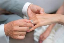 Ring exchange during an engagement ceremony catered by Sri Lakshmi Caterers