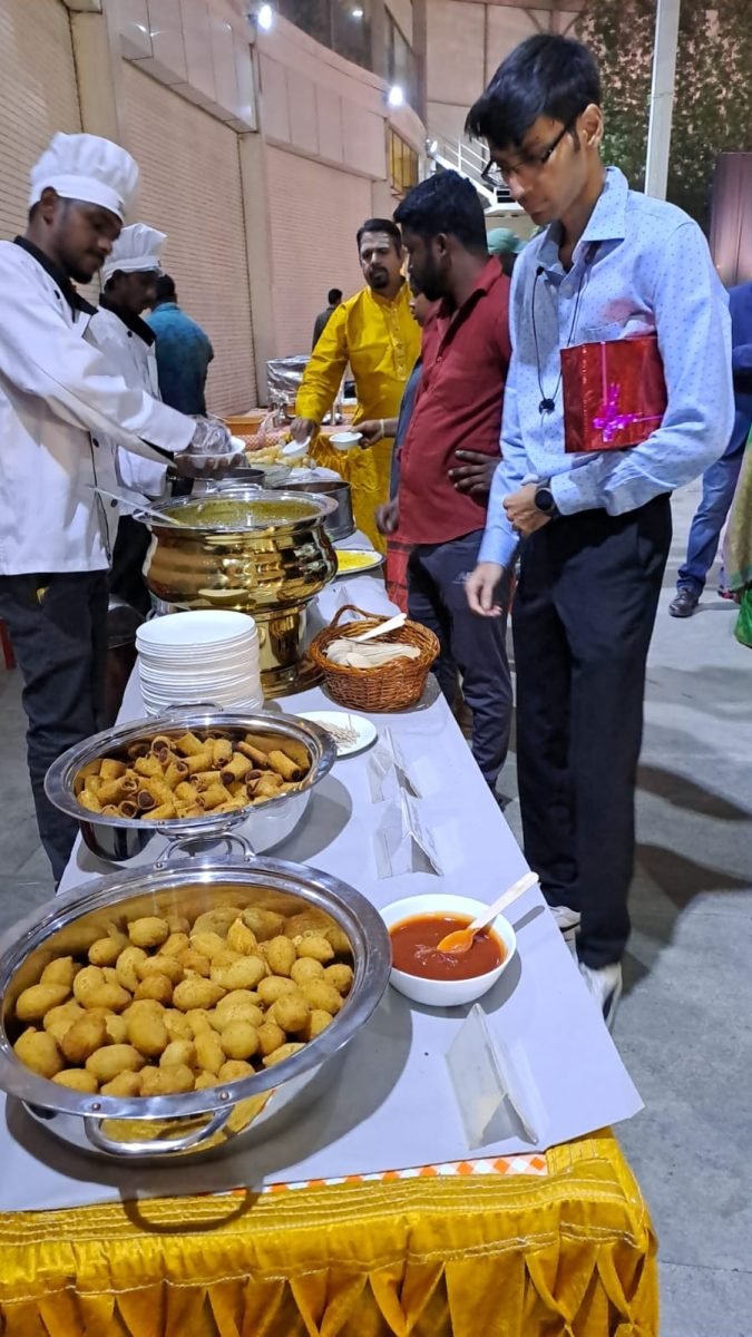 Guests helping themselves at an evening snacks buffet
