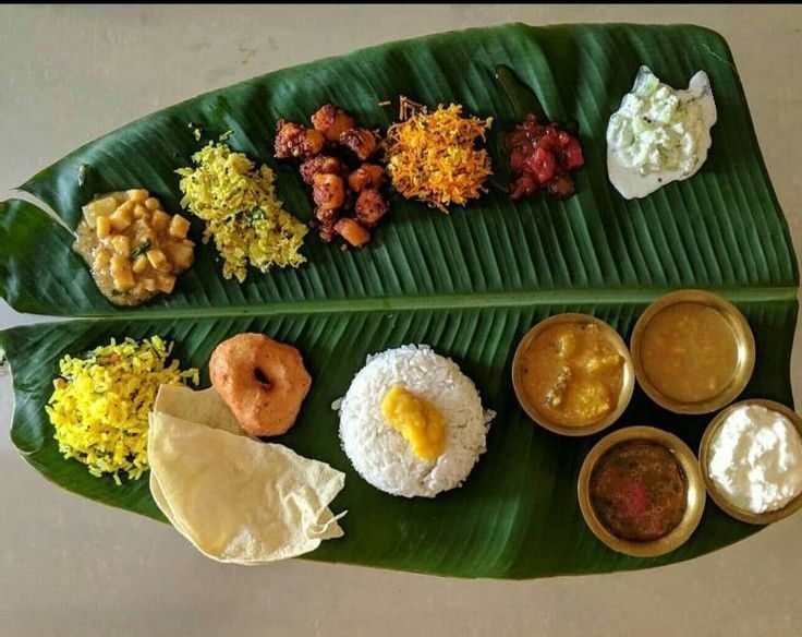 Seemantham guests served a traditional meal on banana leaves